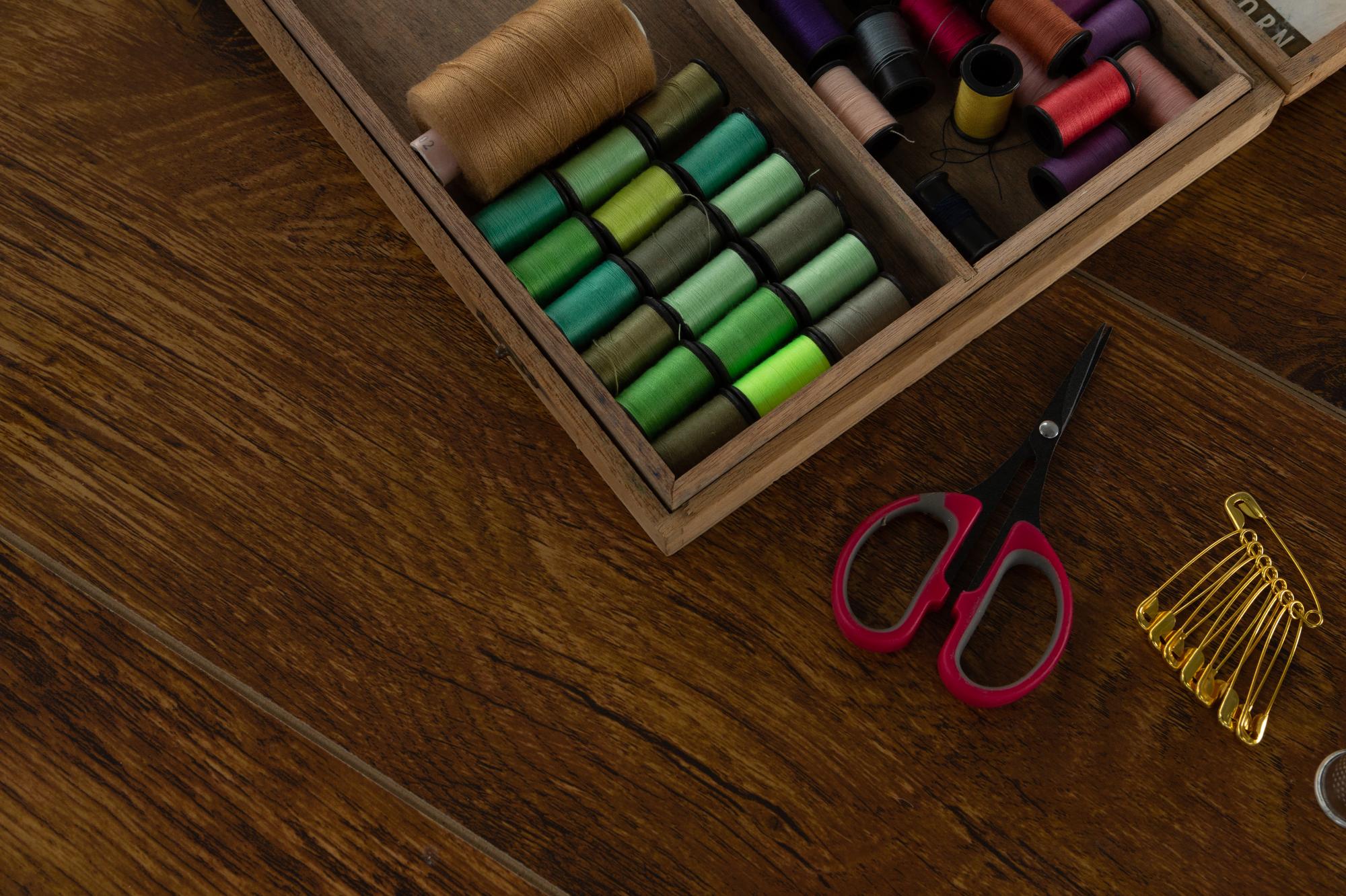 Workshop table with threads and needles