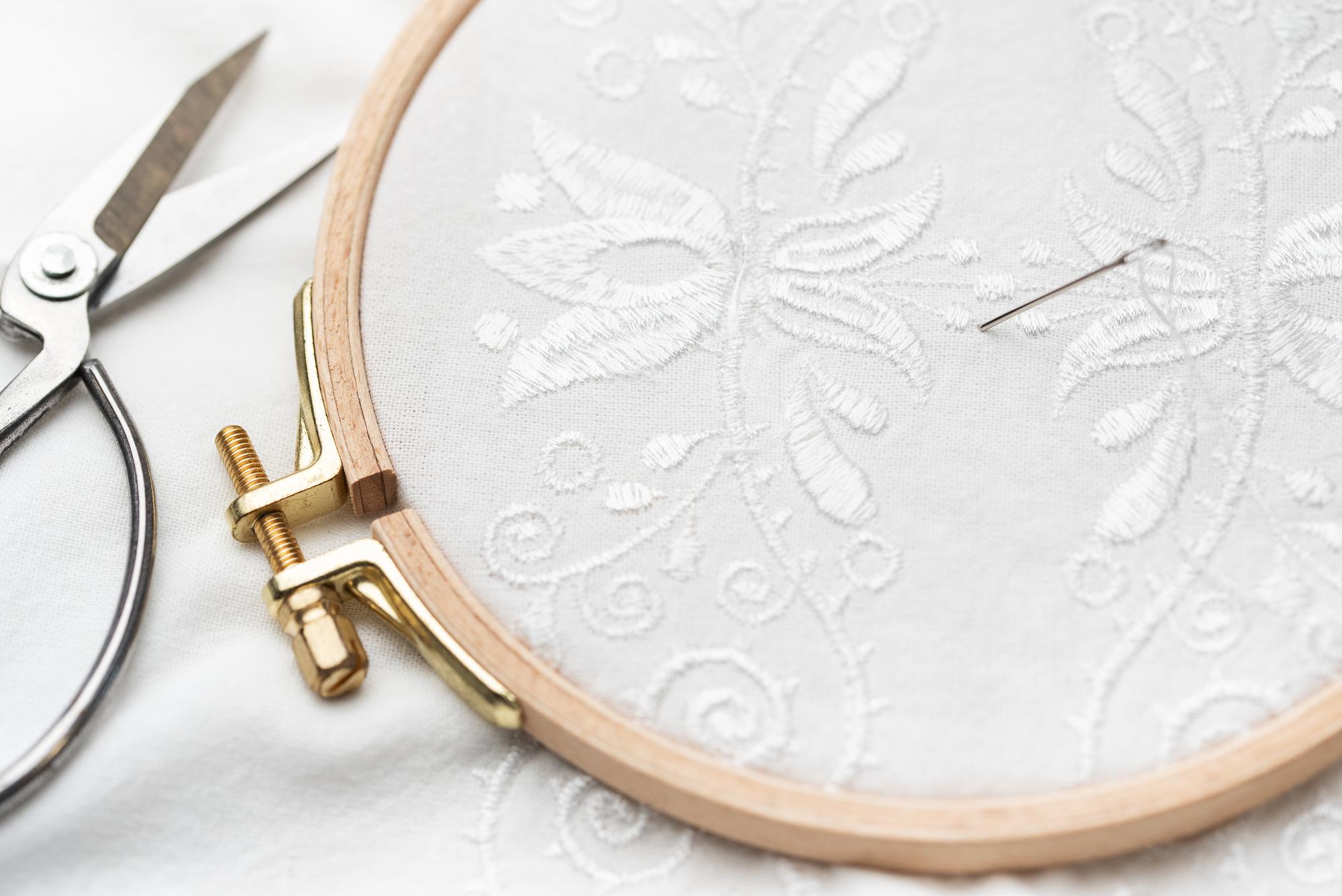 Floral embroidery on cotton sample